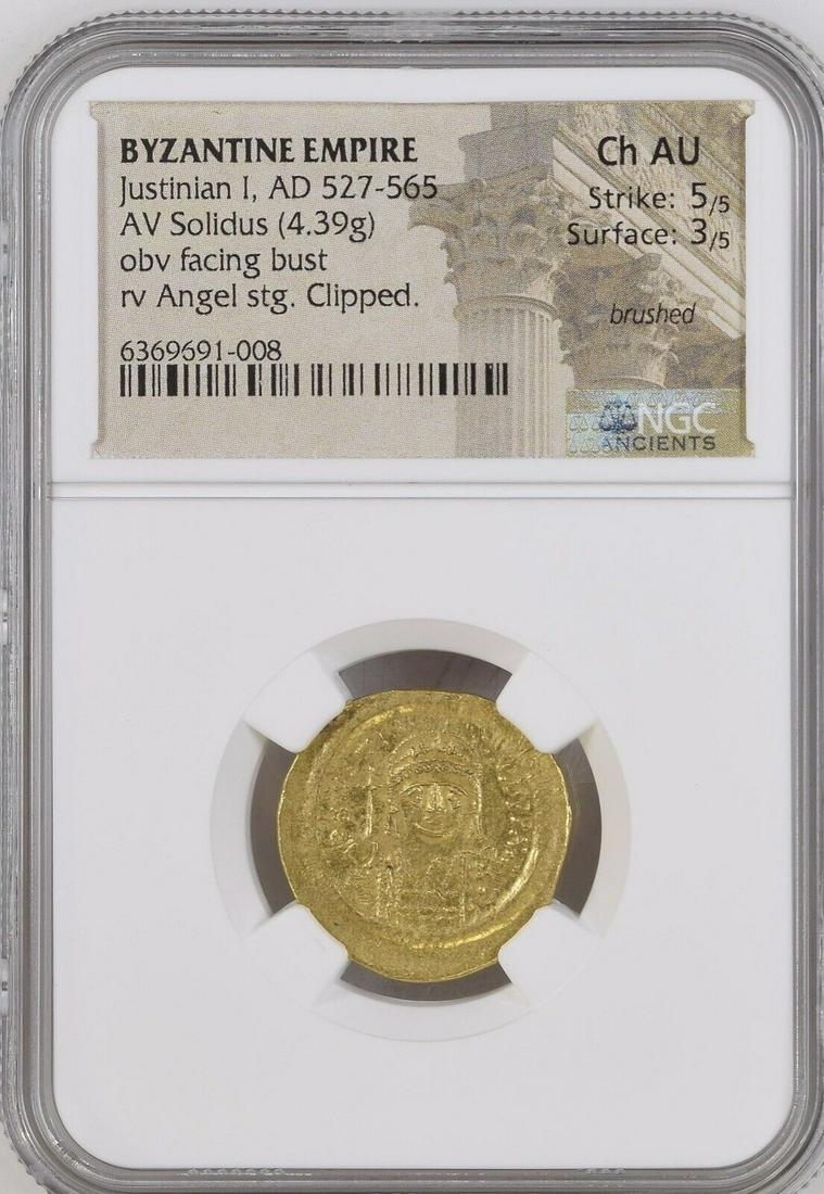 Justinian I. 527-565. AV Solidus  (4.39 gm). Constantinople mint. NGC (1 of 2)