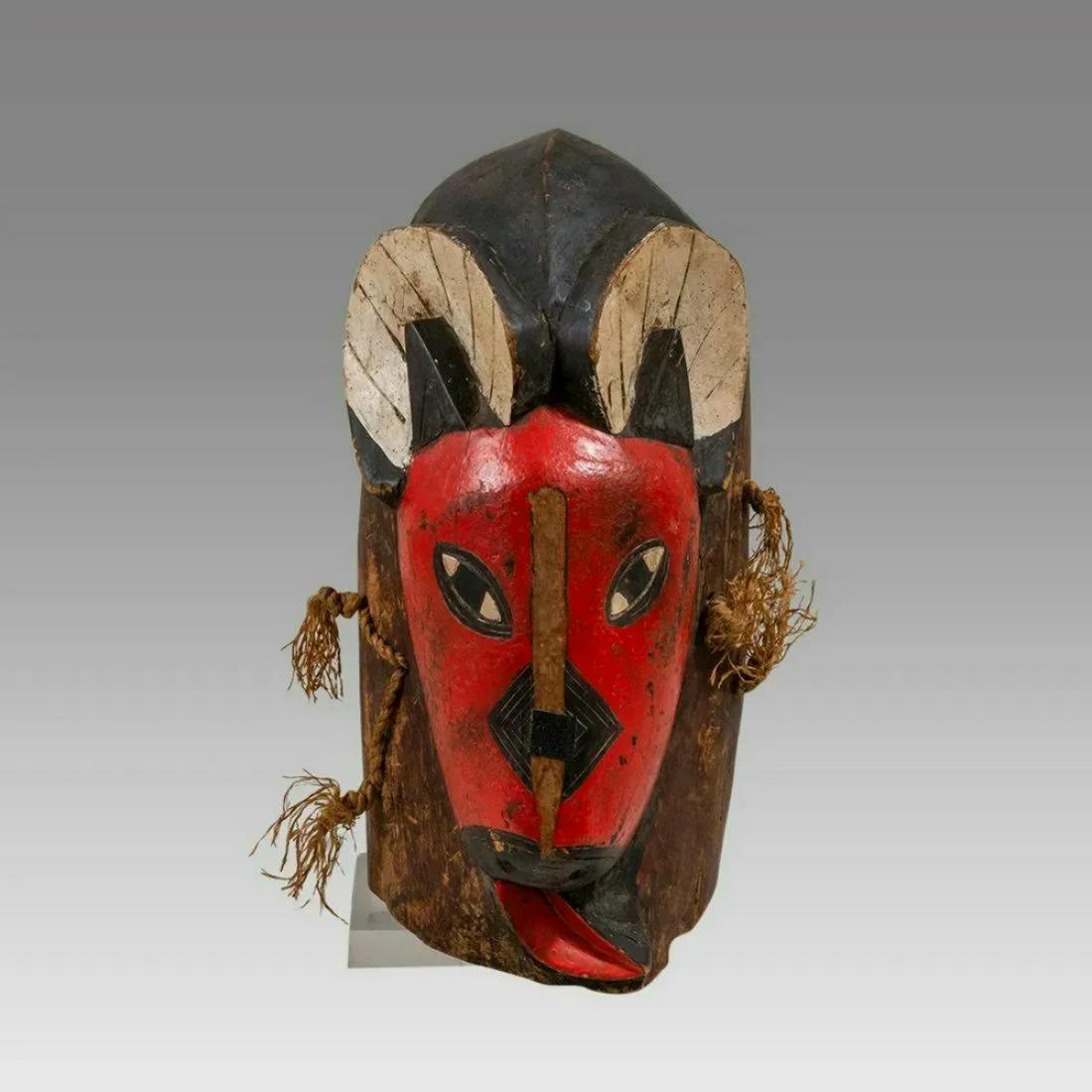 Africa, Cote d'Ivoire Baule Painted Wood Face Mask. (1 of 3)