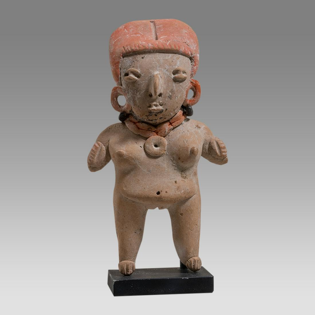 Ancient Pre Columbian Terracotta Female Figure c.250 BC.: Ancient Pre Columbian Terracotta Female Figure c.250 BC. Size 3 3/4 inches length. Ancient Terracotta standing female figure wearing loop type earrings and big necklace. Condition: perfect. Provenance