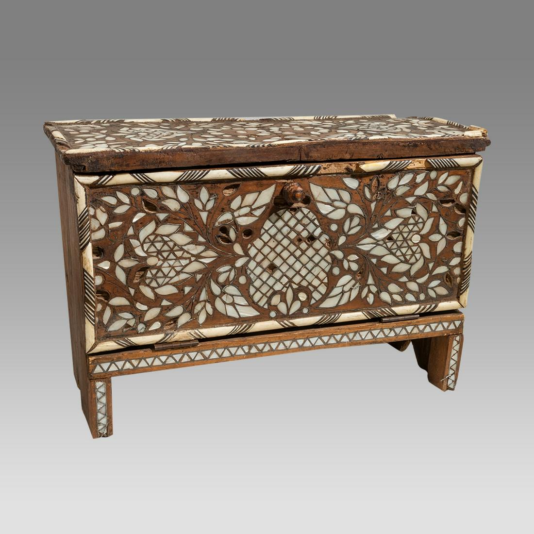 19th century Syrian Chest with Mother Of pearls.: 19th century Syrian Chest with Mother Of pearls. Size 20 x 8 inches, 13 1/2 inches high. Antique Wooden chest with front door inlay with bone and mother of pearls.