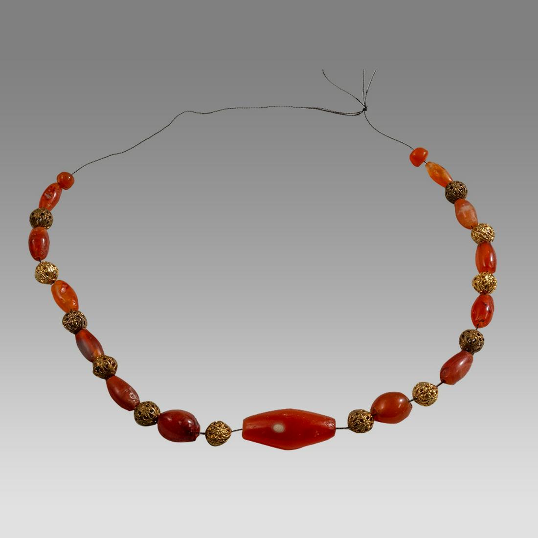 Ancient Roman Agate Beads Necklace c.2nd century AD.: Ancient Roman Agate Beads Necklace c.2nd century AD. Size 12 1/2 inches length. Ancient Roman red Agate beads mixed with gold filled filigree beads necklace. wearable. Provenance: Private NYC Collecti