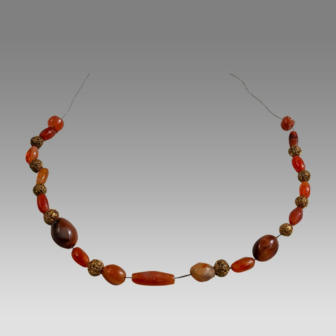 Ancient Roman Agate Beads Necklace c.2nd century AD.: Ancient Roman Agate Beads Necklace c.2nd century AD. Size 13 inches length. Ancient Roman red Agate beads mixed with gold filled filigree beads necklace. wearable. Provenance: Private NYC Collection o