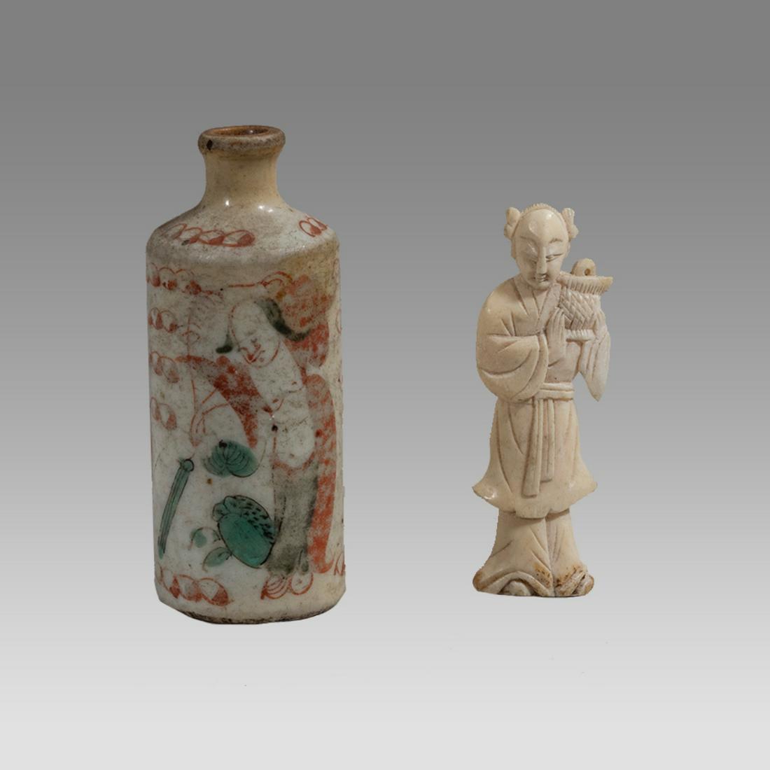 Lot of 2 Antique Chinese Ceramic Bottle and Bone Figure.: Lot of 2 Antique Chinese Ceramic Bottle and Bone Figure. Size 2 5/8 - 3 1/4 inches high. Ceramic bottle decorated with figures (old sticker probably from old sale) together with carved bone figure of 
