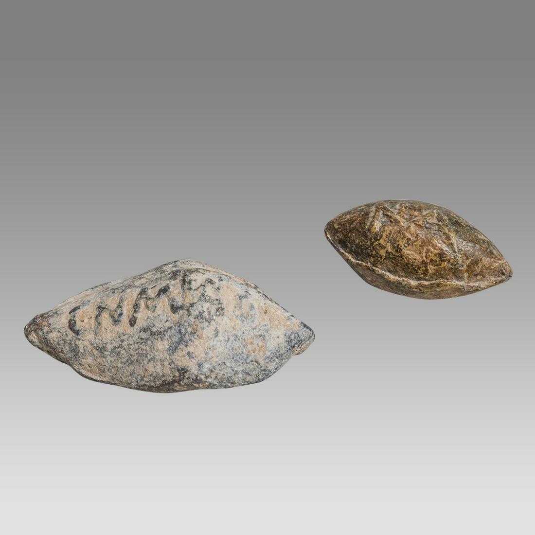 Lot of 2 Ancient Greek, Roman Lead Sling Shots with inscription c.1st century AD. (1 of 2)