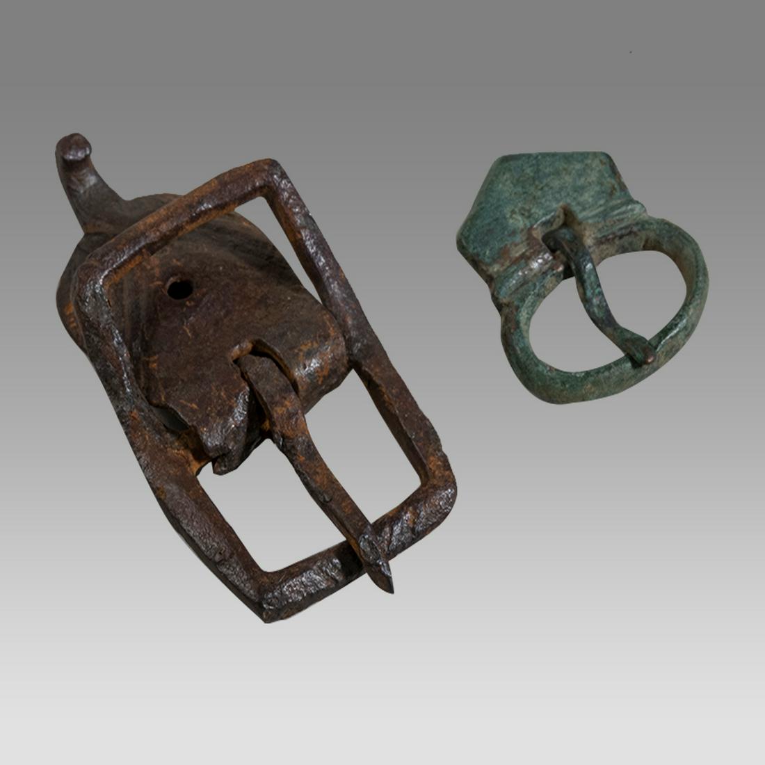 Lot of 2 Ancient Roman Bronze Belt Buckles c.1st-2nd century AD.: Lot of 2 Ancient Roman Bronze Belt Buckles c.1st-2nd century AD. Size 2 1/4 - 1 inches length. A collection of 2 bronze belt buckles. Provenance: Collection of David Van Vleck, Jr of Brooklyn NY acqui