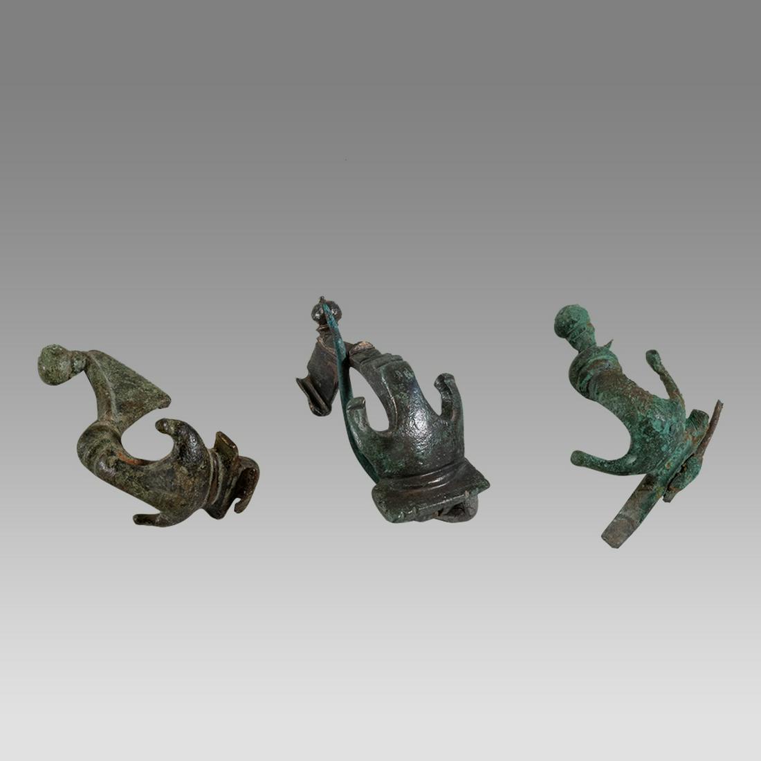 Lot of 3 Ancient Roman Dolphin type Bronze Fibulas c.1st-2nd century AD. (1 of 1)