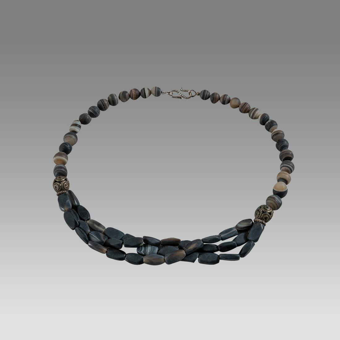 Near Eastern Banded Agate Bead Necklace.: Near Eastern Banded Agate Bead Necklace. Size 19 1/4 inches length. Size of beads 8-14 mm. Fine single strand large banded agate beads. wearable. Provenance: Ex Pegasi Numismatics MI