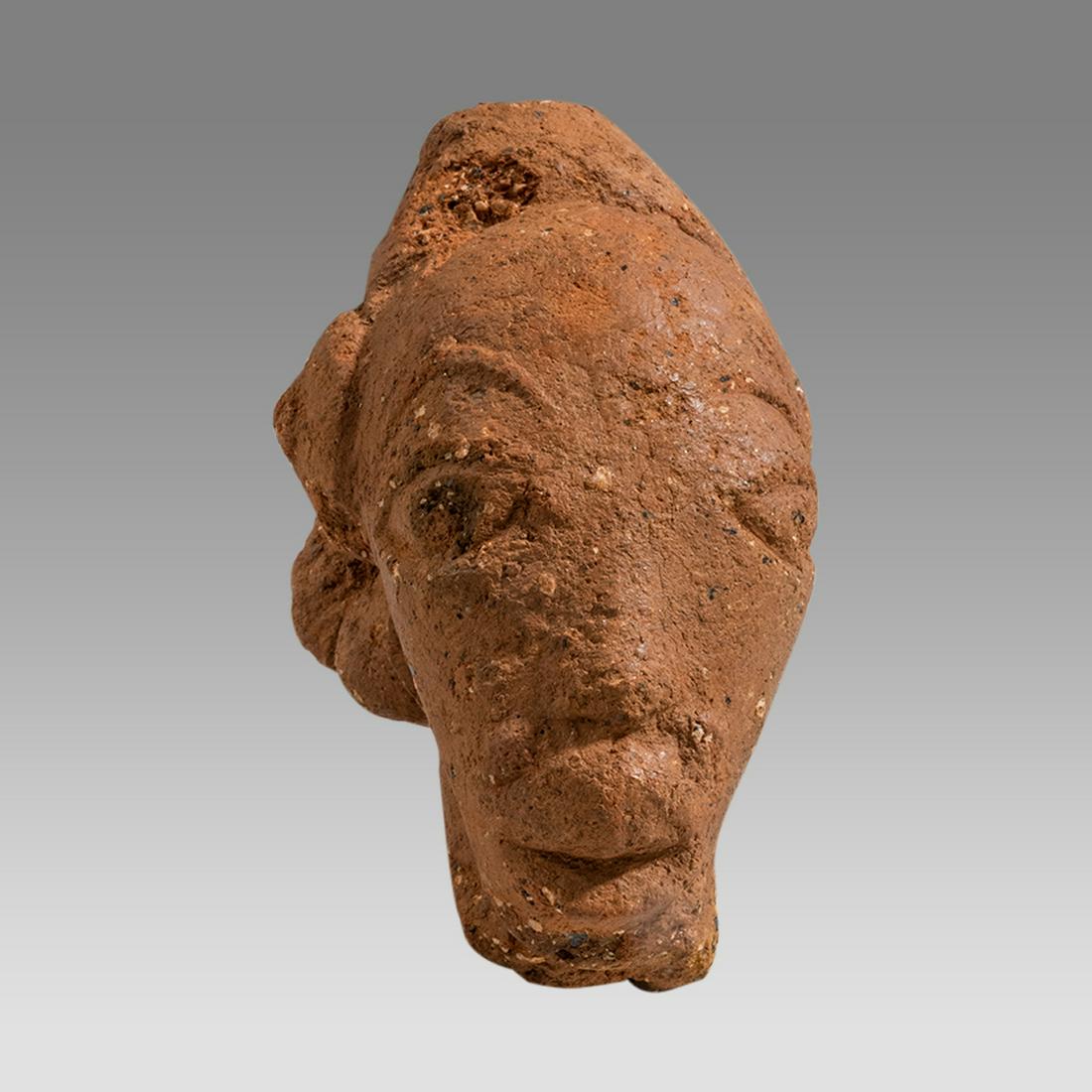 Nok figure-Terracotta Male Head. NOK. NIGERIA, II CENTURY BC - II CENTURY CE.: Nok figure-Terracotta Male Head. NOK. NIGERIA, II CENTURY BC - II CENTURY CE. Size 4 1/2 inches high. A terracotta head of a man. Ex Private New York city collection acquired 1980's.