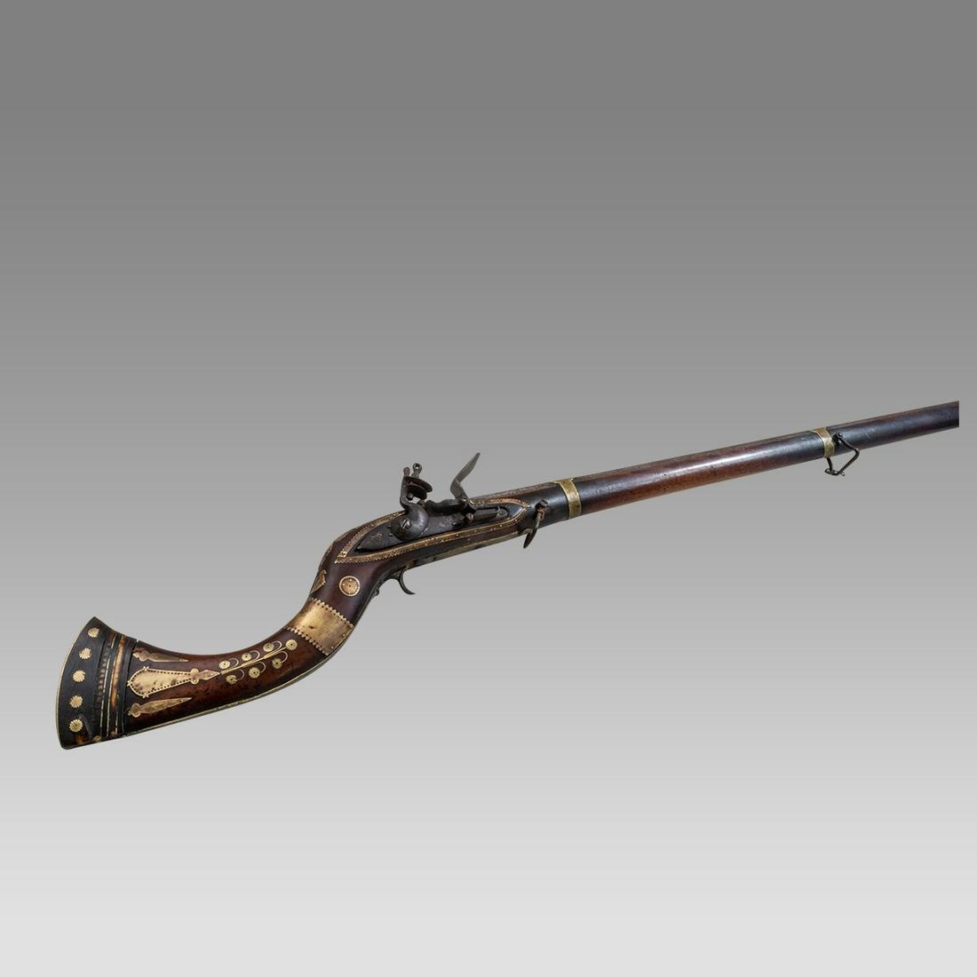 18th century Ottoman Turkish Rifle.: 18th century Ottoman Turkish Rifle. Size 61 inches length. A large Turkish Rifle with steel, brass and bone inlay over wooden handle.