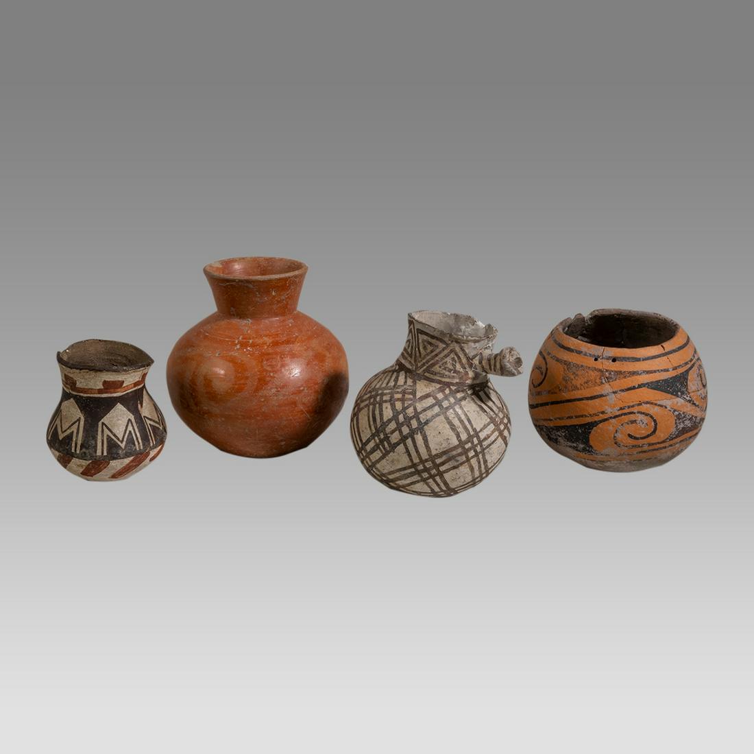 Lot of 4 American Indian South West Pottery Bowls c.1000-1300 AD.: Lot of 4 American Indian South West Pottery Bowls c.1000-1300 AD. Size 3 3/4 to 5 1/4 inches high. A collection of 4 Arizona American Indian pottery bowls with decoration. Provenance: Ex Dr Arnold R.S