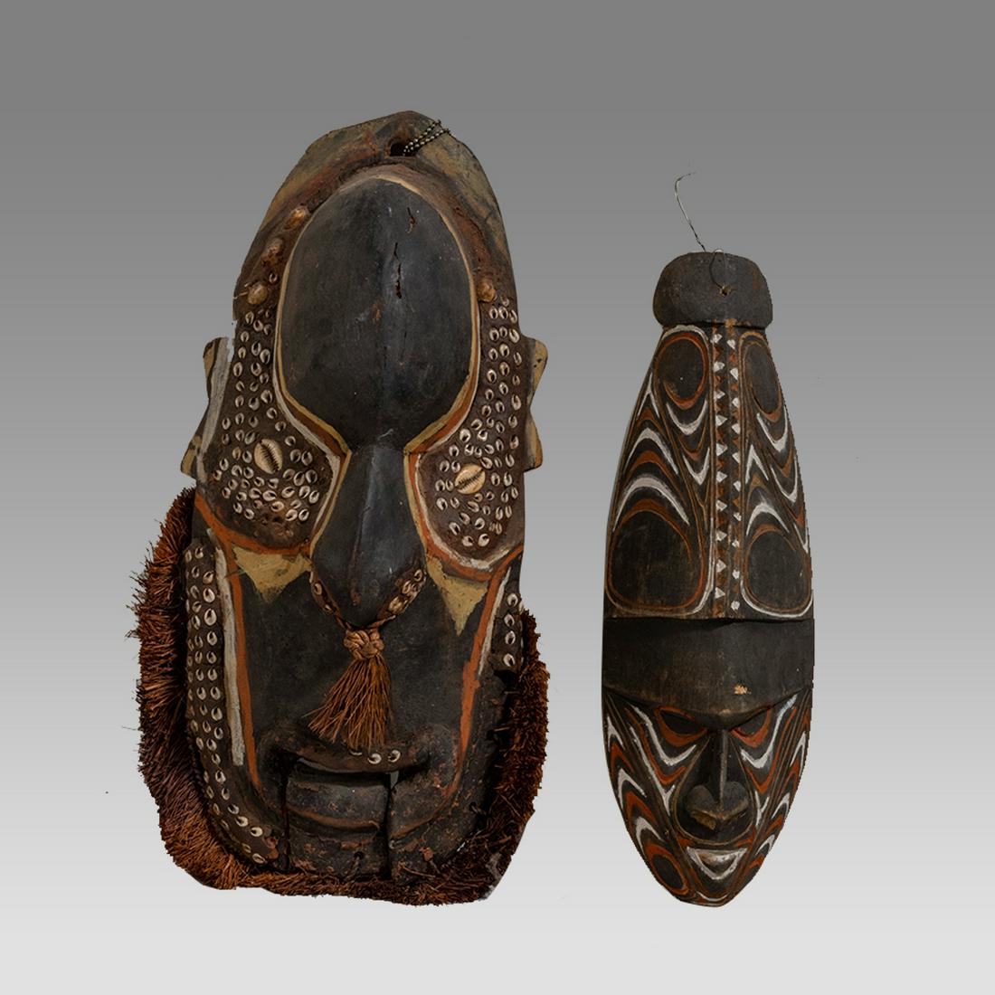 Lot of two African, Guinean Carved Wood Masks. (1 of 2)