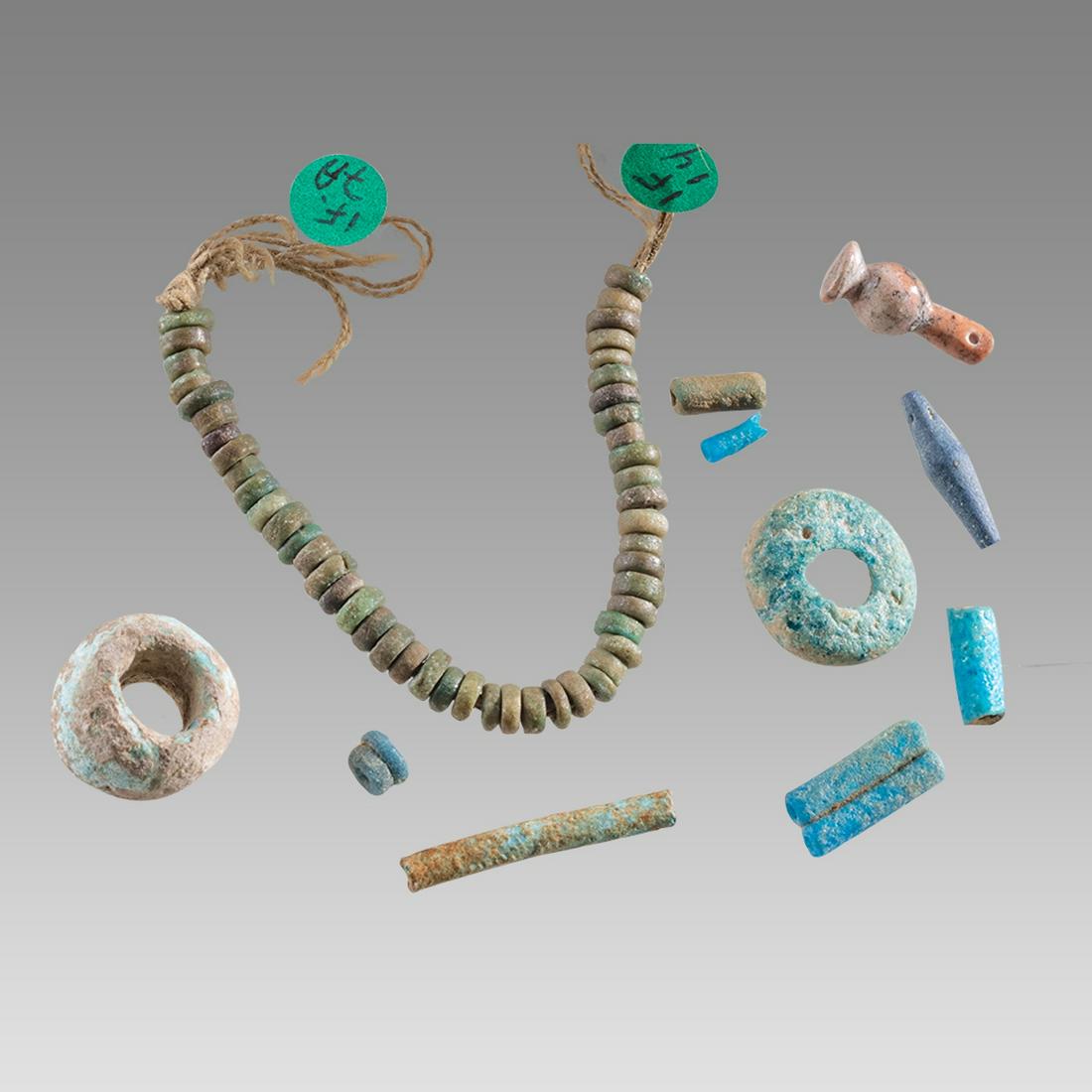 Egyptian beads of various types from Pink Granite to Faience, Tubular Bead, Deep Blue Faience,: Egyptian beads of various types from Pink Granite to Faience, Tubular Bead, Deep Blue Faience, 13x3mm. Six Beads (1 is a double tubular, 2 are circular) to test against other bead collections. Bead wi