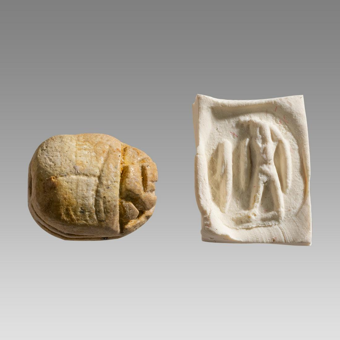 Ancient Egyptian Scarab, Horus and Maat feather, Faience, 1st Millennium BC,: Ancient Egyptian Scarab, Horus and Maat feather, Faience, 1st Millennium BC, 12x9x7mm. Most of the faience glaze is gone. See Hyksos Scarabs 161-169. ES- 6 Ra 1-3. Provenance: Ex Washington DC Collect