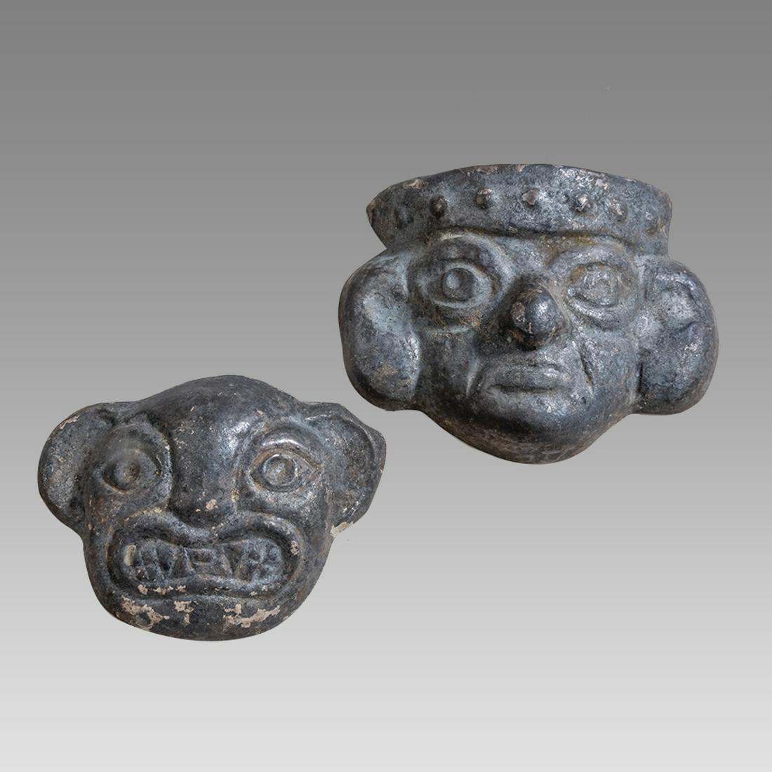 Lot of 2 Silver heads a. Mask of a Lord with Dramatic Ear Spools, Moche, Silver, (1 of 2)