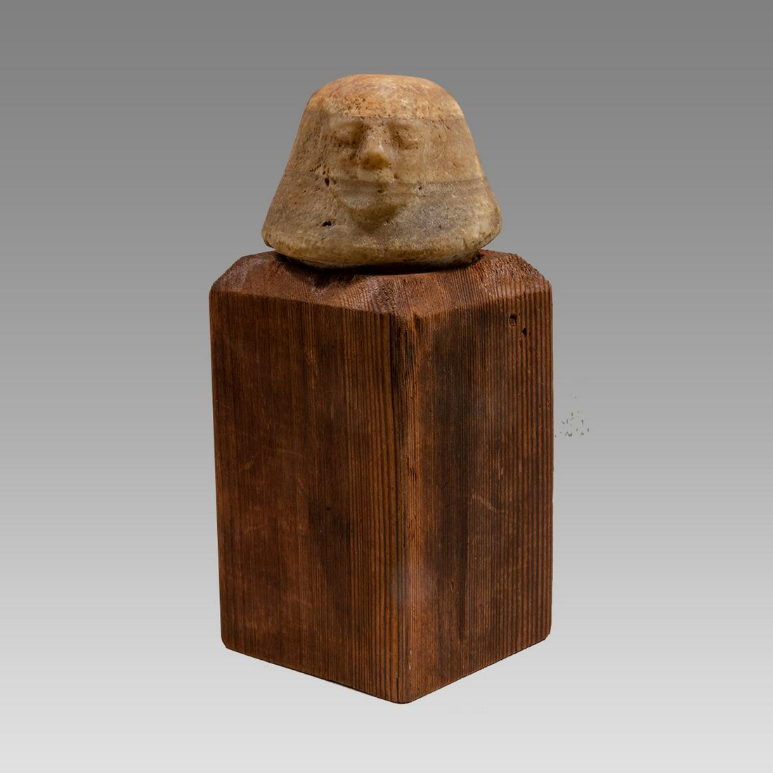 Ancient Egyptian alabaster head canopic from a canopic jar, Late Period, c. 664 - 332 BC, (1 of 3)