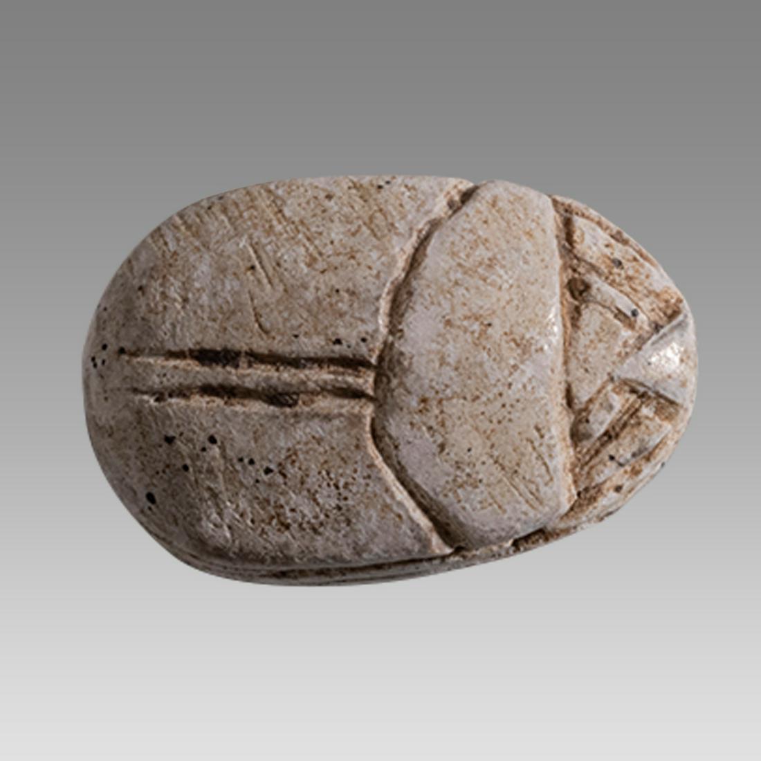 Ancient Egyptian Steatite stone Scarab c.1650-1100 BCE.: Ancient Egyptian Steatite stone Scarab c.1650-1100 BCE. Size 12 x 8 mm. Glazed steatite scarab. with stealized beatle back. Provenance: Ex Private California Collection acquired in the USA market