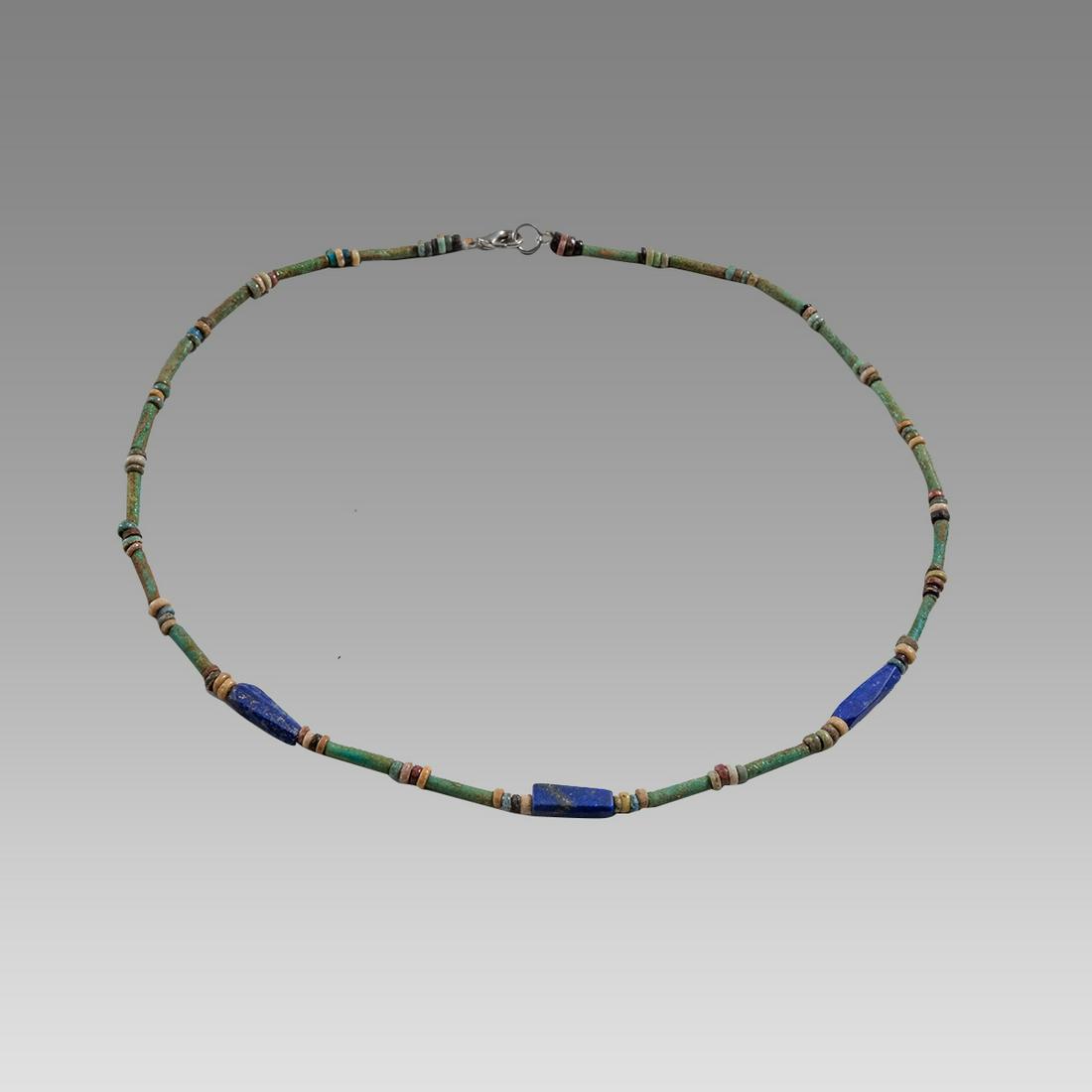 Ancient Egyptian Faience, Bead Necklace c.300-50 BC.: Ancient Egyptian Faience, Bead Necklace c.300-50 BC. Size 17 3/4 inches length. Great Looking single strand Faience Bead necklace with lapis lazuli beads. wearable. Provenance: Ex Secret Eyes Gallery 