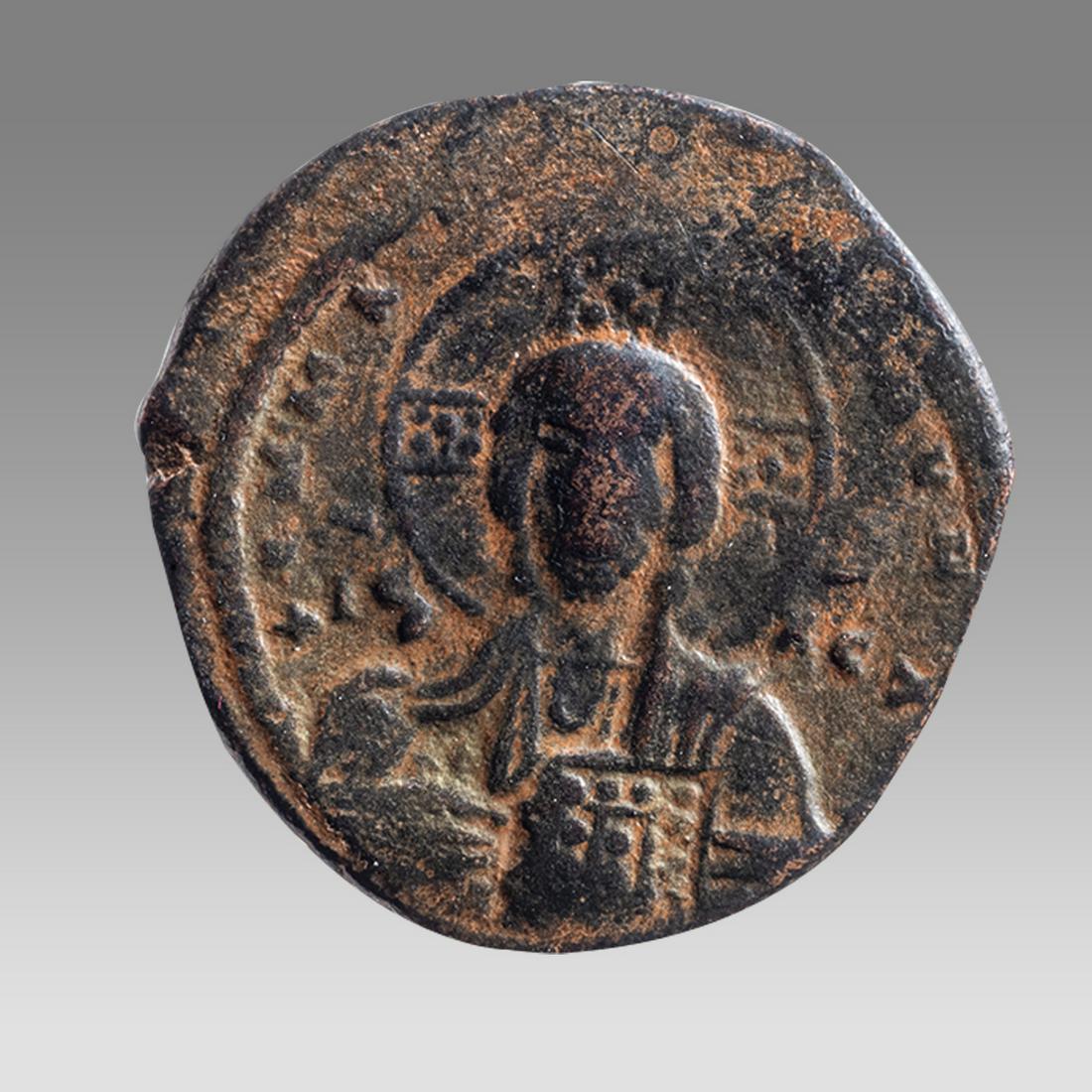 Ancient Byzantine Bronze anonymous follis with bust of Christ Basil II AD 995-1025. (1 of 3)