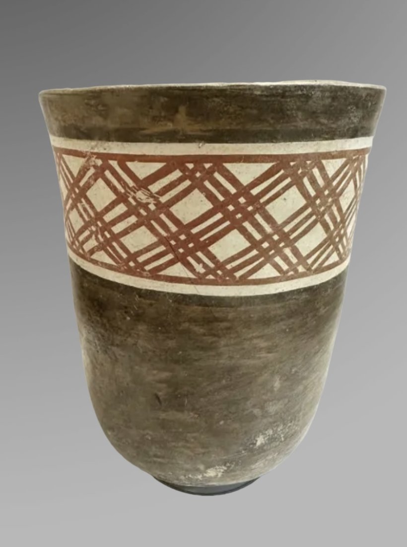 Nazca Pottery Kero Ca. 400-600 A.D., Nazca, (Peru).: Nazca Pottery Kero Ca. 400-600 A.D., Nazca, (Peru). Size 5 5/8 inches high. NJ collection, acquired 1970â€™s. Old collection number on base: AWY1008.