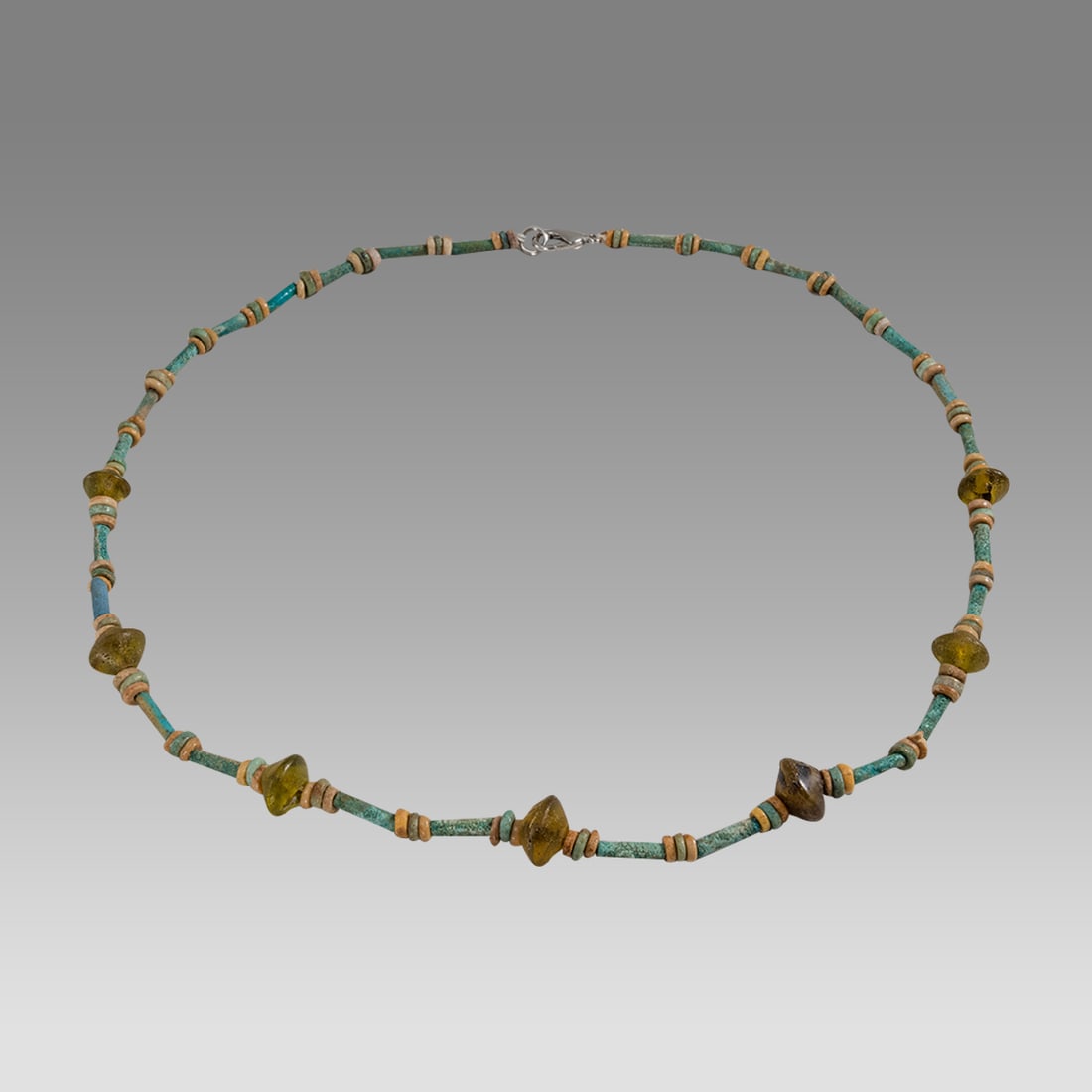 Ancient Egyptian Faience, Bead Necklace c.300-50 BC.: Ancient Egyptian Faience, Bead Necklace c.300-50 BC. Size 20 inches length. Great Looking single strand Faience Bead necklace mixed with glass beads. wearable. Provenance: Ex Secret Eyes Gallery New Y