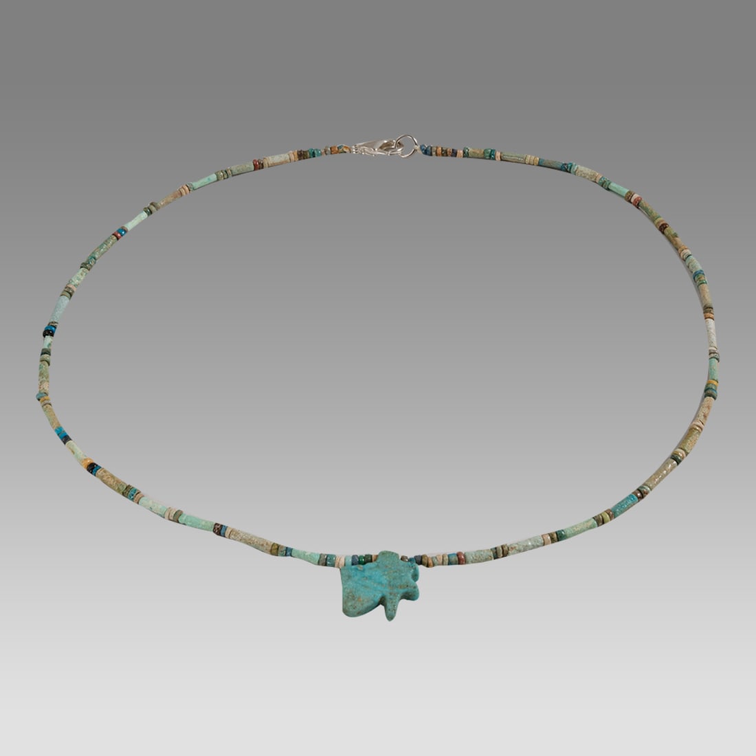 Ancient Egyptian Faience, Bead Necklace c.300-50 BC.: Ancient Egyptian Faience, Bead Necklace c.300-50 BC. Size 18 5/8 inches length. Great Looking single strand Faience Bead necklace with Eye of Horus Amulet. wearable. Provenance: Ex Secret Eyes Gallery