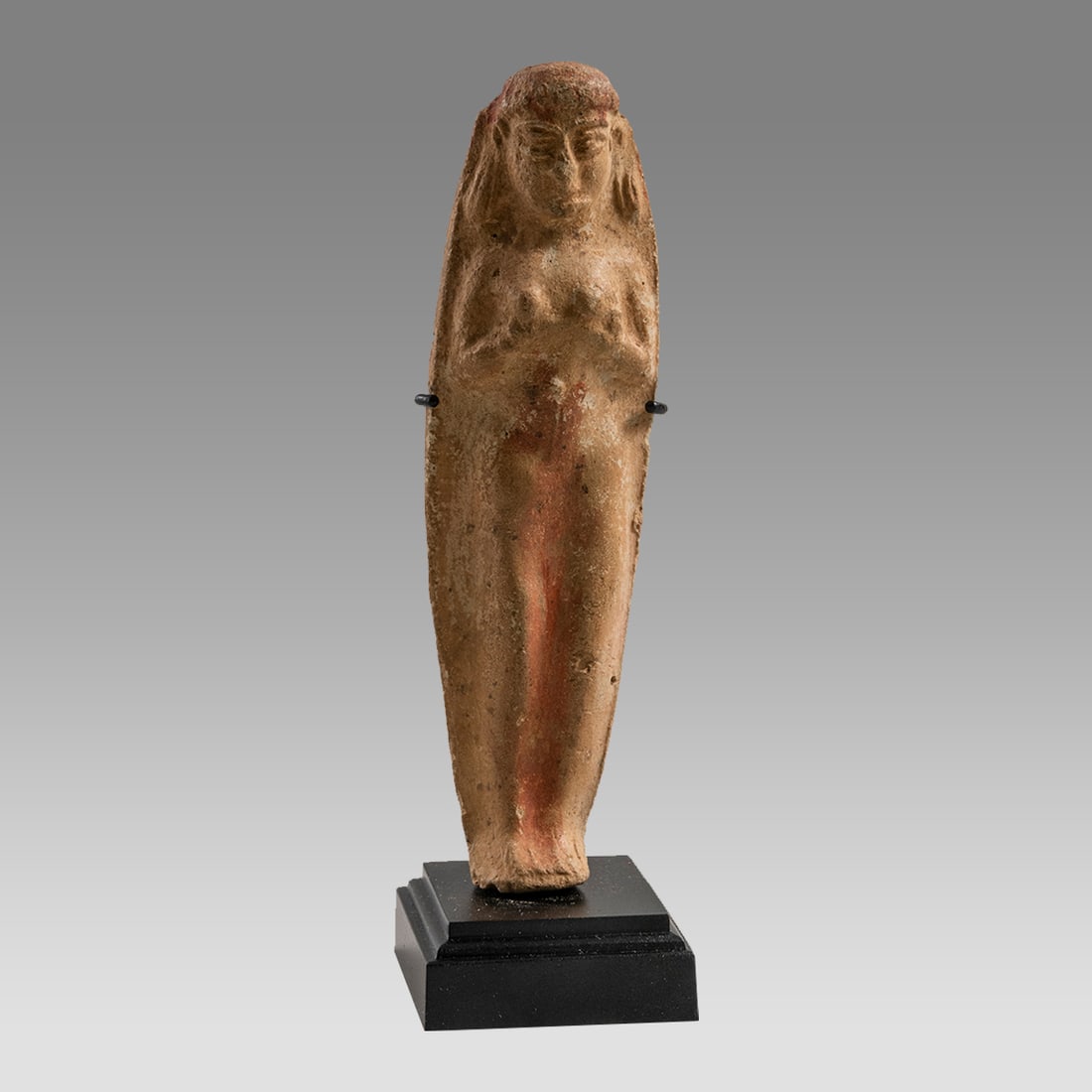 ANCIENT Holy Land Ashtar Idol Iron Age c.800 B.C.: ANCIENT Holy Land Ashtar Idol Iron Age c.800 B.C. Size 4 inches high + stand. Fine mold made Iron age terracotta Ashtar Idol plaque. Custom mounted. Provenance: Ex David Hendin collection acquired in 