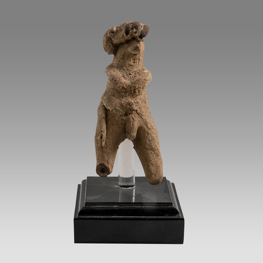 ANCIENT Holy Land Erotic Votive Figure Bronze Age c.2000 B.C.: ANCIENT Holy Land Erotic Votive Figure Bronze Age c.2000 B.C. Size 3 inches high + stand. Rare Erotic terracotta male figure showing large penis, wearing headdress with both hands floded together. Rar