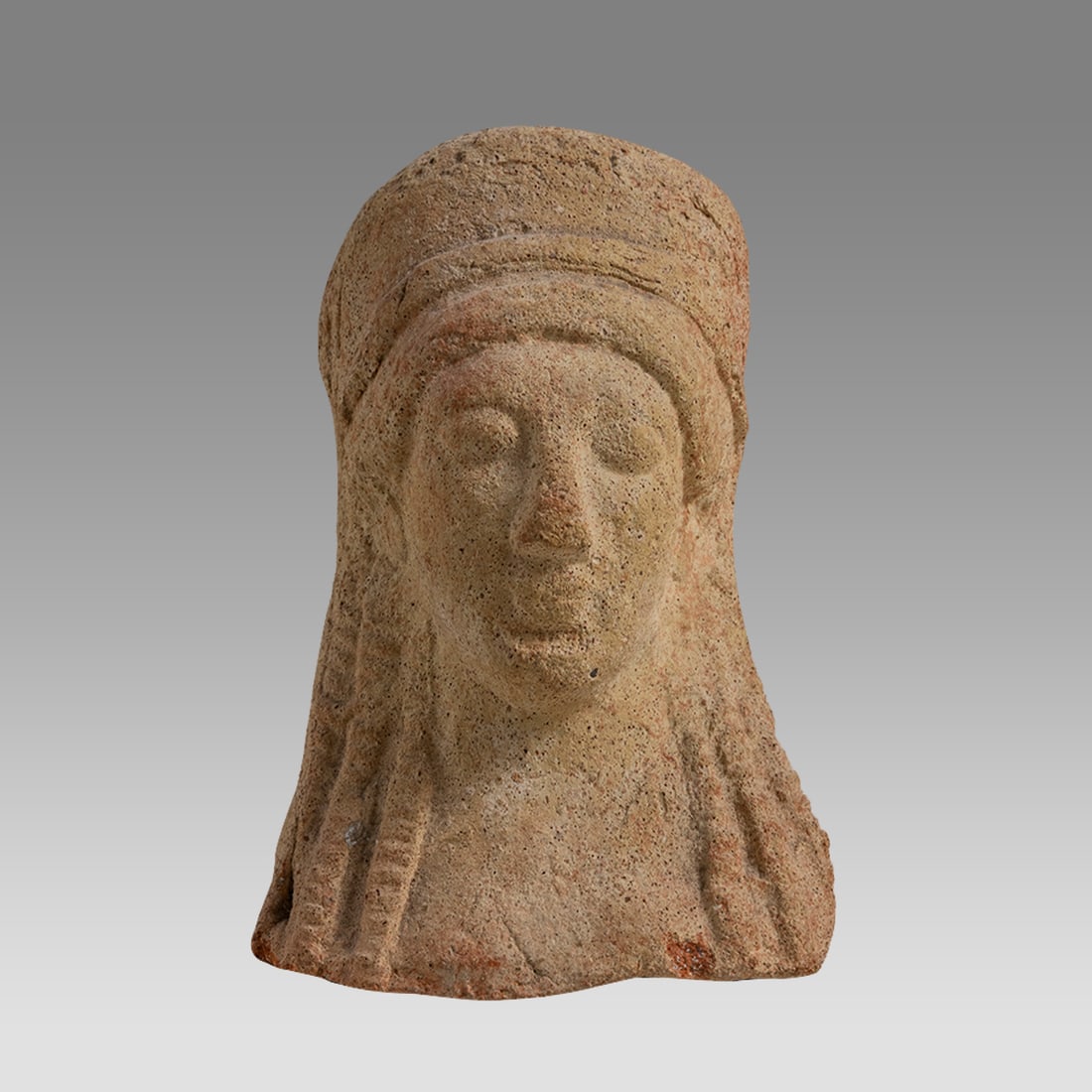 Ancient Greek Terracotta Votive Female Head c.5th century BC.: Ancient Greek Terracotta Votive Female Head c.5th century BC. Size 4 1/4 inches high. Fine thick walled terracotta votive head of a woman with long braided hair. Great quality and details. Provenance: