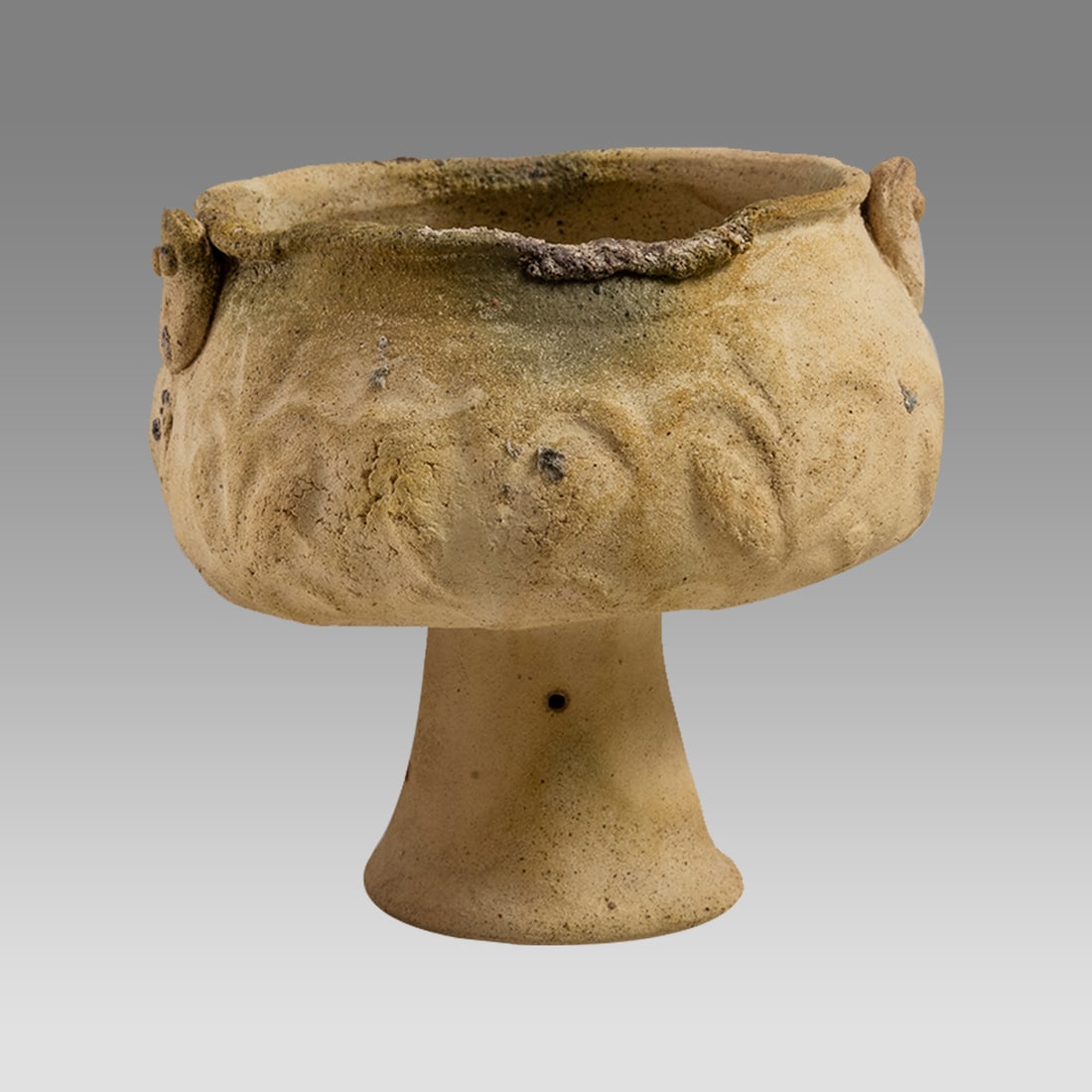 Chancay Pottery Chalice Ca. 800-1200 A.D.: Chancay Pottery Chalice Ca. 800-1200 A.D. Size 4 1/2 x 4 1/2 inches. A Footed Chalice with twin face handles. Provenance: Estate of David Sheridan, Branchburg, NJ., acquired 1950's . descent to family