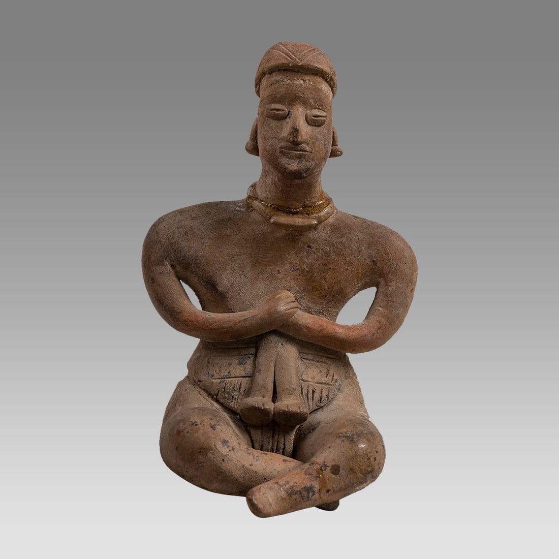 Pre-Columbian Colima Cross-Legged Seated Female Figure (ca. 300BC-300 CE). (1 of 3)