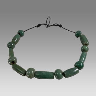 Olmec - Proto Maya Jade Bead Necklace Pre-Columbian, Southern Mexico to Guatemala,: Olmec - Proto Maya Jade Bead Necklace Pre-Columbian, Southern Mexico to Guatemala, Olmec to Proto-Maya culture, ca. 500 BCE to 300 CE. A stunning ensemble of 15 sizeable, hand-carved jade beads, 8