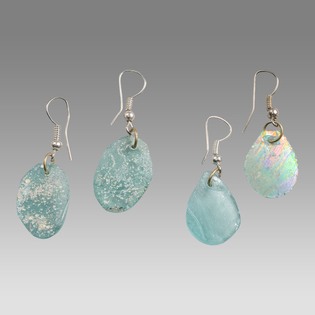 Lot of 2 Ancient Roman Glass Fragment set in silver earrings. (1 of 2)