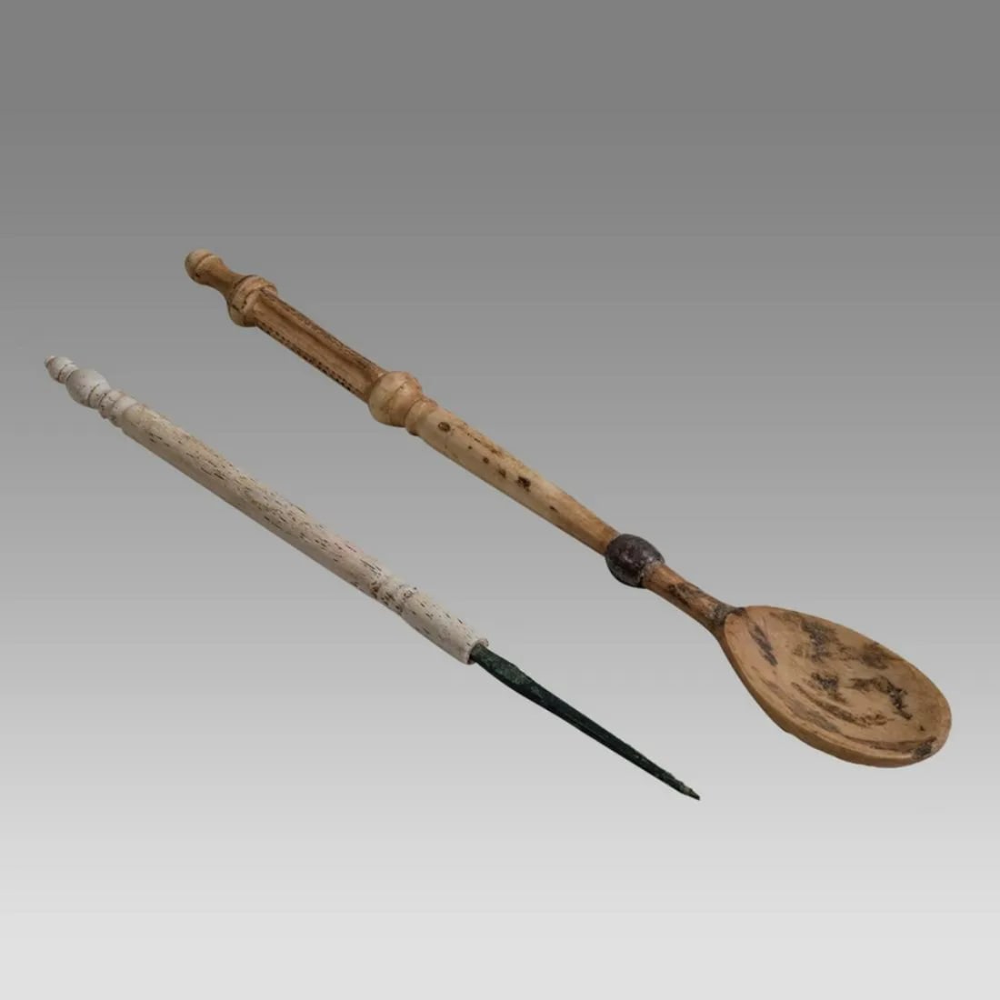 Lot of 2 Ancient Roman AWL Tool, Bone Spoon c.2nd century AD.: Lot of 2 Ancient Roman AWL Tool, Bone Spoon c.2nd century AD. Size 6 3/4 - 7 3/4 inches length. Rare AWL tool with Bone handle together with Bone spoon with silver collar. Provenance: Private NYC Dr C