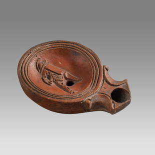 Ancient Roman Thracian Oil Lamp With Gladiator c.1st century AD.: Ancient Roman Thracian Oil Lamp With Gladiator c.1st century AD. Size 3 1/2 inches length. Beautiful mold made Ancient Roman terracotta oil lamp, depicting Gladiator in the center wearing Thracian hel