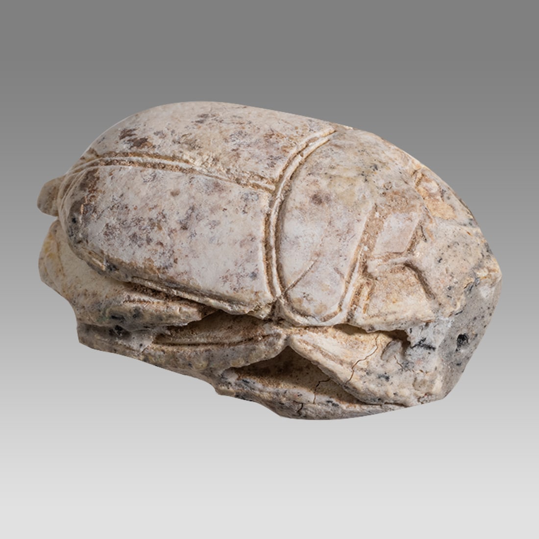 Ancient Egyptian Steatite stone Scarab c.1500-1100 BCE.: Ancient Egyptian Steatite stone Scarab c.1500-1100 BCE. Size 23 x 16 mm. Glazed steatite scarab New Kingdom with stealized beatle back. Lion at base. Provenance: Ex Secret Eyes Gallery New York 1970's