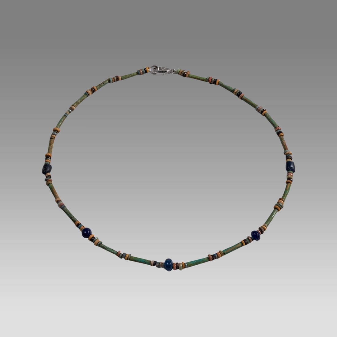 Ancient Egyptian Faience, Bead Necklace c.300-50 BC.: Ancient Egyptian Faience, Bead Necklace c.300-50 BC. Size 17 1/4 inches length. Great Looking single strand Faience Bead necklace with blue glass beads. wearable. Provenance: Ex Secret Eyes Gallery Ne