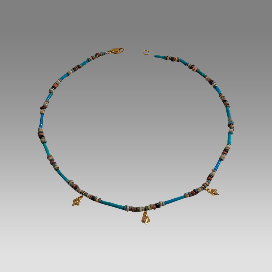 Ancient Egyptian Faience, Bead Necklace c.300-50 BC.: Ancient Egyptian Faience, Bead Necklace c.300-50 BC. Size 14 3/4 inches length. Great Looking single strand Faience Bead necklace with gold bee amulets. wearable. Provenance: Ex Secret Eyes Gallery Ne