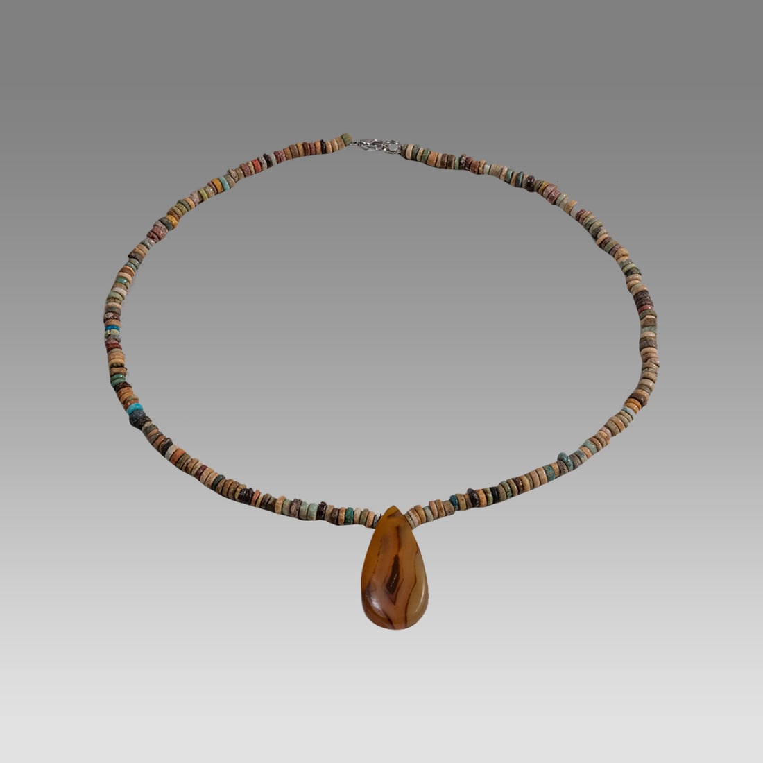Ancient Egyptian Faience, Bead Necklace c.300-50 BC.: Ancient Egyptian Faience, Bead Necklace c.300-50 BC. Size 17 inches length. Great Looking single strand Faience Bead necklace with Agate amulet. wearable. Provenance: Ex Secret Eyes Gallery New York 1