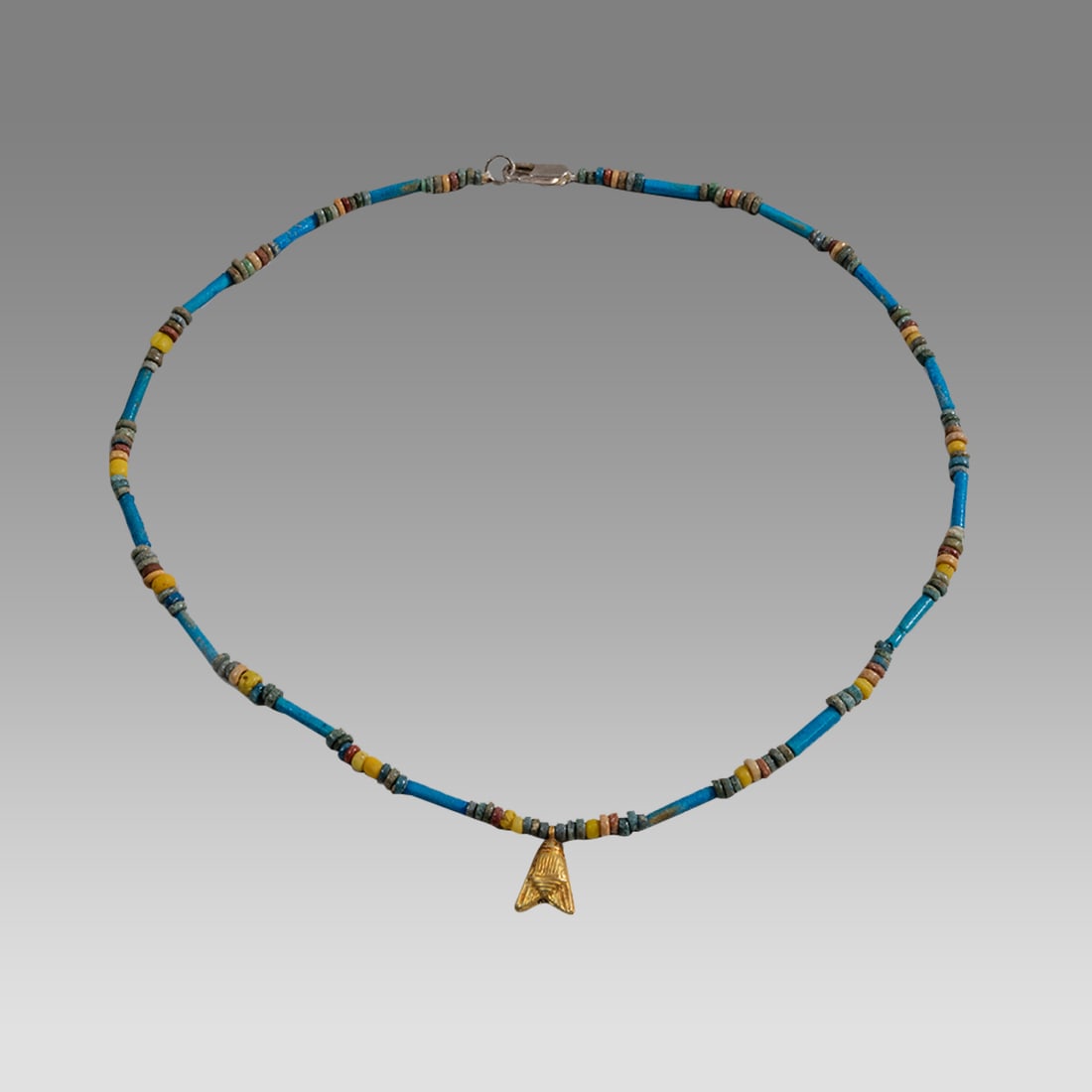 Ancient Egyptian Faience, Bead Necklace c.300-50 BC.: Ancient Egyptian Faience, Bead Necklace c.300-50 BC. Size 18 inches length. Great Looking single strand Faience Bead necklace with gold Bee amulet. wearable. Provenance: Ex Secret Eyes Gallery New Yor