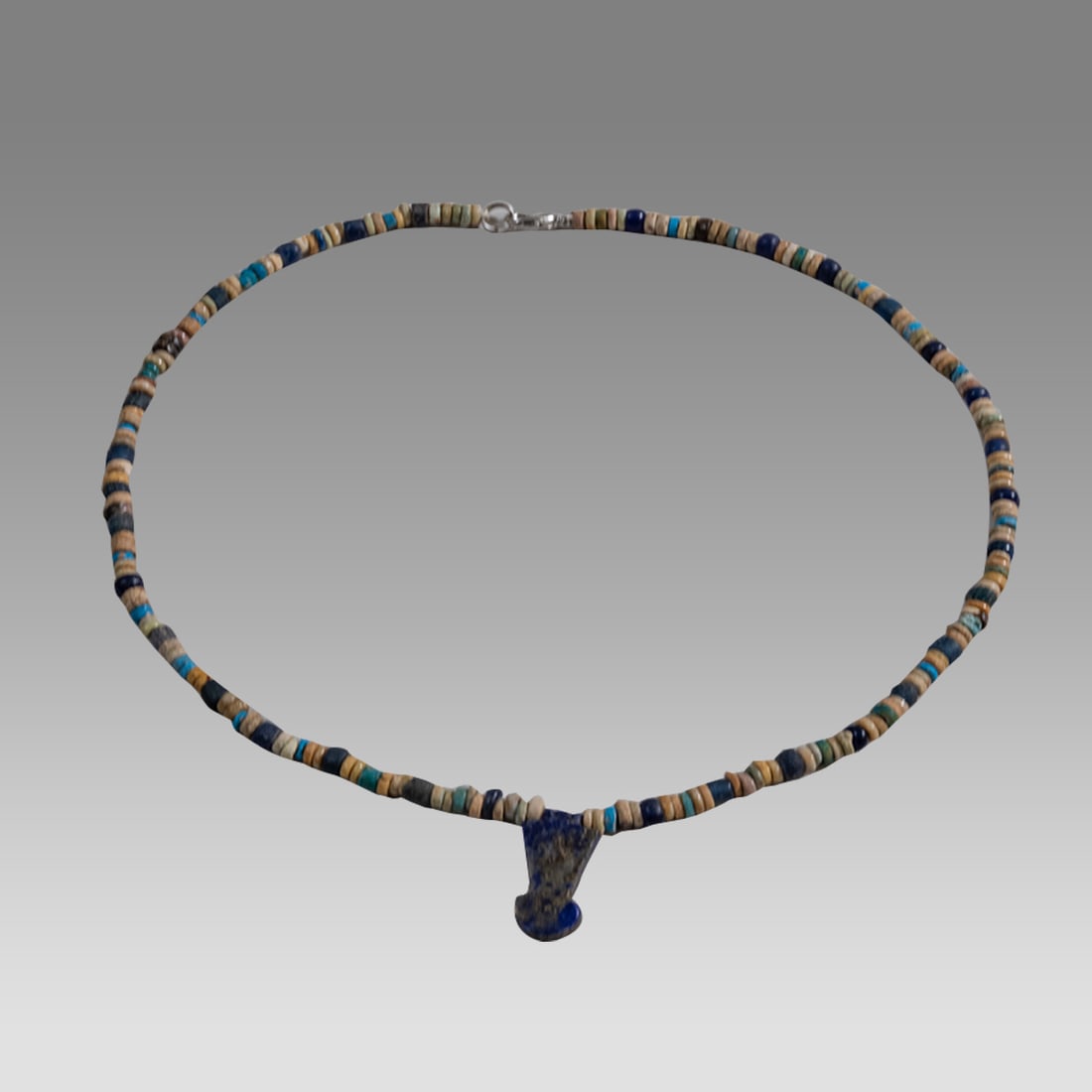Ancient Egyptian Faience, Bead Necklace c.300-50 BC.: Ancient Egyptian Faience, Bead Necklace c.300-50 BC. Size 16 3/4 inches length. Great Looking single strand Faience Bead necklace with Lapis Lazuli Amulet. wearable. Provenance: Ex Secret Eyes Gallery