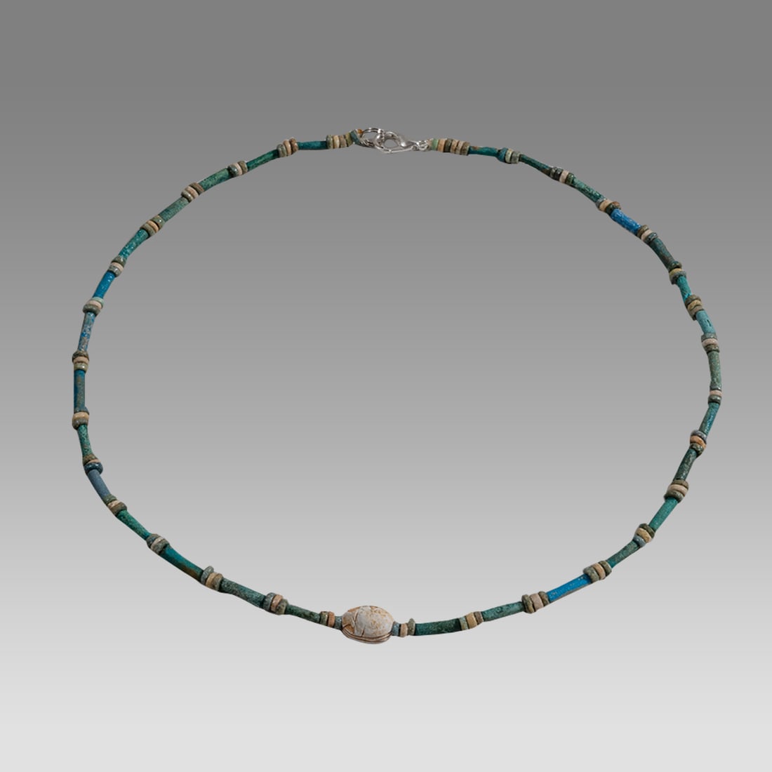 Ancient Egyptian Faience, Bead Necklace c.300-50 BC.: Ancient Egyptian Faience, Bead Necklace c.300-50 BC. Size 17 3/4 inches length. Great Looking single strand Faience Bead necklace with Steatite Scarab. wearable. Provenance: Ex Secret Eyes Gallery New