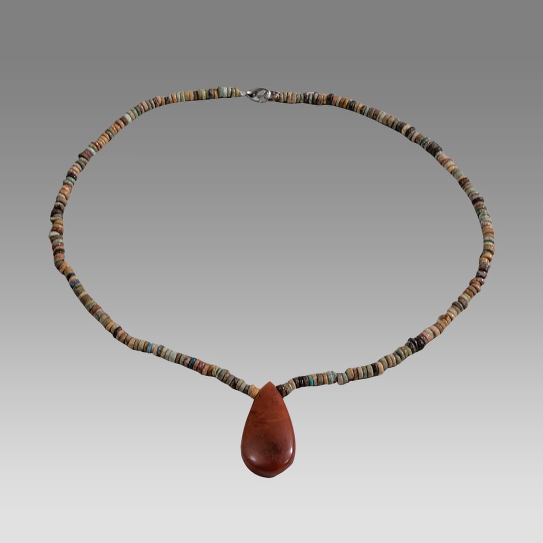 Ancient Egyptian Faience, Bead Necklace c.300-50 BC.: Ancient Egyptian Faience, Bead Necklace c.300-50 BC. Size 17 3/4 inches length. Great Looking single strand Faience Bead necklace with Agate amulet. wearable. Provenance: Ex Secret Eyes Gallery New Yo