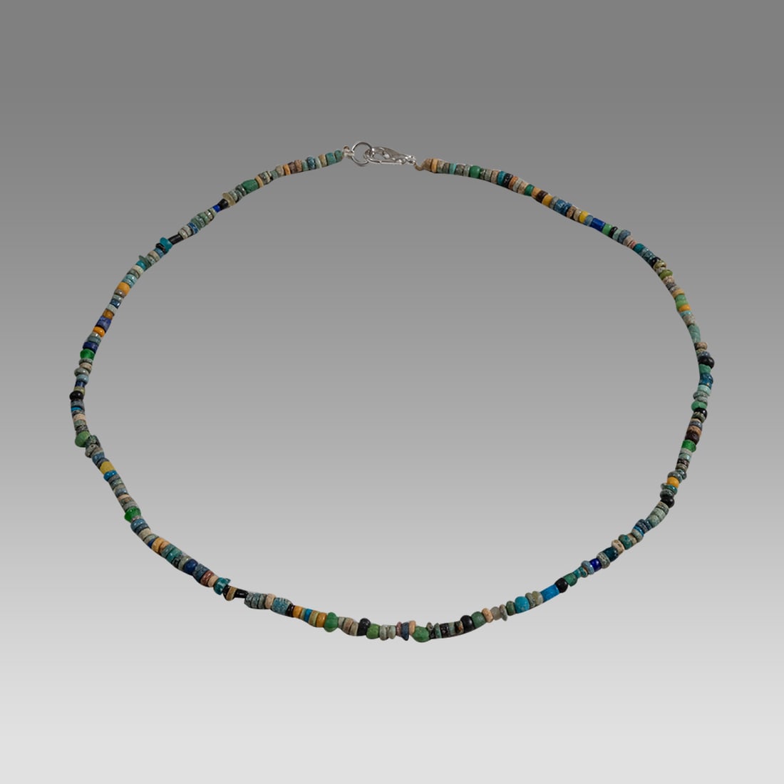 Ancient Egyptian Faience, Bead Necklace c.300-50 BC.: Ancient Egyptian Faience, Bead Necklace c.300-50 BC. Size 17 1/2 inches length. Great Looking single strand Faience Bead necklace with glass beads. wearable. Provenance: Ex Secret Eyes Gallery New Yor