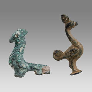 Lot of 2 Ancient Byzantine Bronze Birds c.8th century AD.: Lot of 2 Ancient Byzantine Bronze Birds c.8th century AD. Size 1 5/8 - 2 inches high. Cast bronze birds, probably part of pin finial. Provenance: Ex Secret Eyes Gallery New York 1970's-1980's