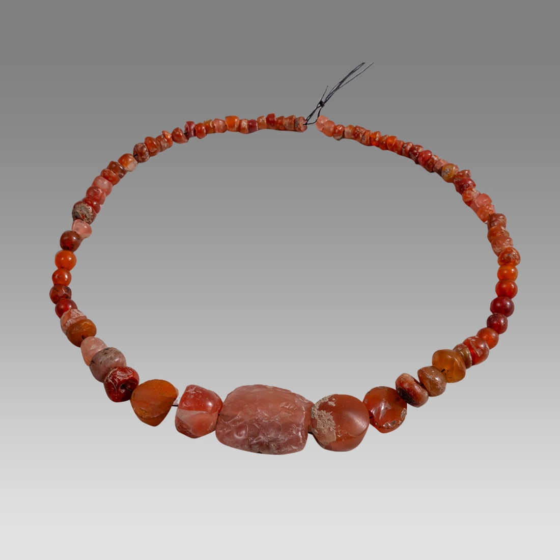 Ancient Roman Agate Beads Necklace c.1st-2nd century AD.: Ancient Roman Agate Beads Necklace c.1st-2nd century AD. Size 15 inches length. size of beads 6 - 27 mm. Ancient Roman Agate beads necklace, needs restring. Provenance: From a NYC collection acquired 