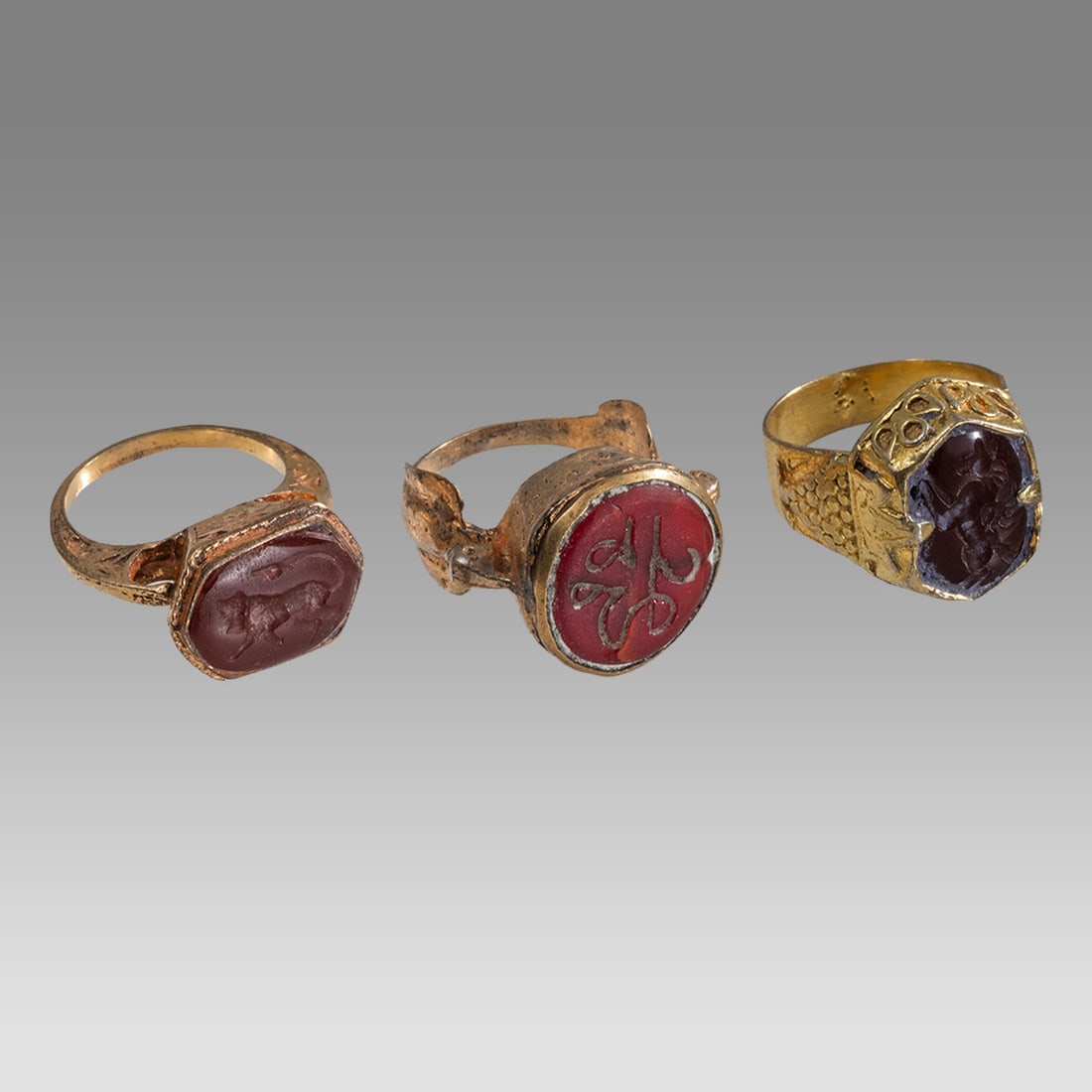 Lot of 3 Antique Sasanian Gold Filled Rings with Agate Intaglios. (1 of 1)