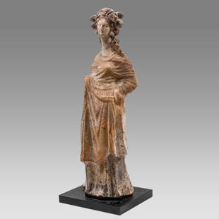 Ancient GREEK. Terracotta Tanagra figurine circa 300 BC.: Ancient GREEK. Terracotta Tanagra figurine circa 300 BC. Size 11 1/4 inches high.+ stand. Large Tanagran polychrome terracotta standing female figure . Her hair is ornamented with a flower garland.