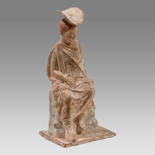 Ancient GREEK. Terracotta Tanagra figurine circa 300 BC.: Ancient GREEK. Terracotta Tanagra figurine circa 300 BC. Size 7 1/2 inches high. Unusual Tanagran polychrome terracotta seated female figure. Wearing ornate hat and drapery, original pigments.