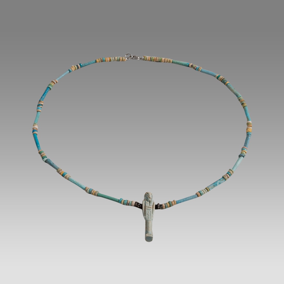 Ancient Egyptian Faience, Bead Necklace With Ibes Amulet c.700-30 BC.: Ancient Egyptian Faience, Bead Necklace With Ibes Amulet c.700-30 BC. Size 19 inches length. Great Looking single strand Faience Bead necklace with Standing Ibes blue faience amulet. wearable. Provena