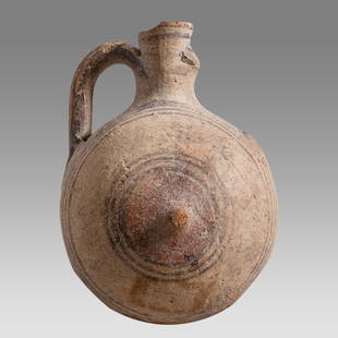 Ancient Mycenaean pottery Flask Circa 1400-1300 B.C.: Ancient Mycenaean pottery Flask Circa 1400-1300 B.C. Size 3 7/8 inches high. A decorated handled flask in reddish slip over a buff ground with encircling bands. Provenance: Ex Private Washington DC co